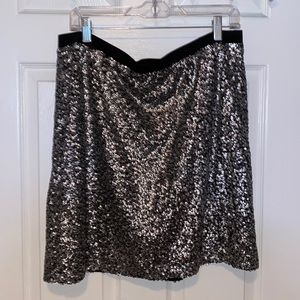 Sequin mini skirt.